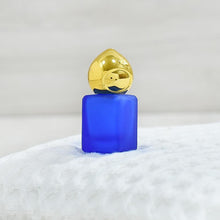 Load image into Gallery viewer, Alluring Blue Ahmar Attar / Perfume Oil
