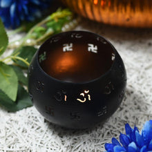Load image into Gallery viewer, Round Black Decorative Candle Holder with Swastik Motifs
