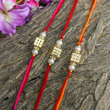 Load image into Gallery viewer, Golden Beaded Dice Rakhi Set of 3
