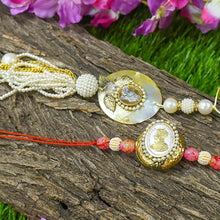 Load image into Gallery viewer, Golden &amp; White Pearl Silver Coin Bhaiya Bhabi Rakhi (Set Of 2)
